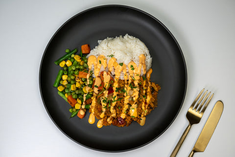 image of a lunch of a rice and chicker and salad healthy premade meal delivery in nyc