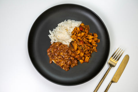 HealthyHolic El Dominicano prepared meal with chicken, jasmine rice, and red beans