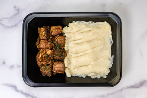 HealthyHolic Steak Bites prepared meal with garlic seared beef and creamy mashed potatoes