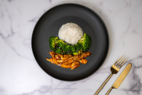 HealthyHolic Teriyaki Chicken prepared meal with jasmine rice, broccoli florets, and teriyaki glaze